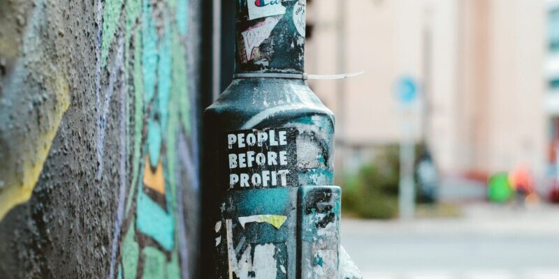 Photo of street pole with graffiti